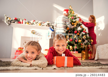 Friendly family celebrating New Year 26014483