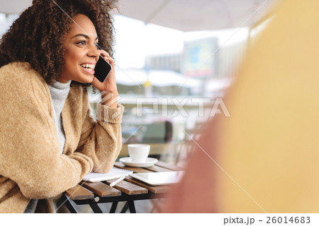 girl using a smartphone to chat girl using a smartphone to chat 26014683