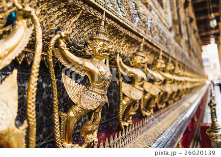 Golden Garuda statues surrounding temple 26020139
