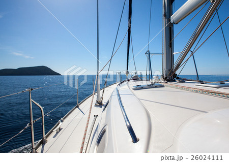 The white sails of yachts on the background  sea The white sails of yachts on the background  sea 26024111