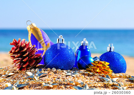 christmas baubles on beach christmas baubles on beach 26030360