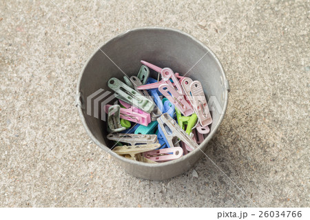 multi-coloured clothes pegs in bucket multi-coloured clothes pegs in bucket 26034766