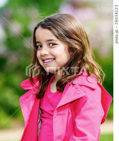 cute child with flower garden on background 26038223