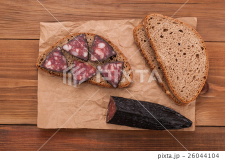 Sandwich with bread on the table. Sandwich with bread on the table. 26044104