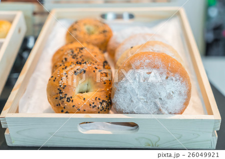 Brightly colored cakes in refrigerator . Brightly colored cakes in refrigerator . 26049921