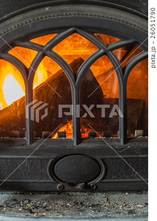 Closeup of burning fire wood in home fireplace. 26051790
