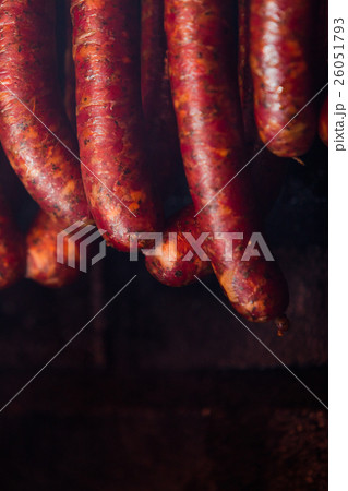 Traditional food. Smoked sausuages in smokehouse. 26051793