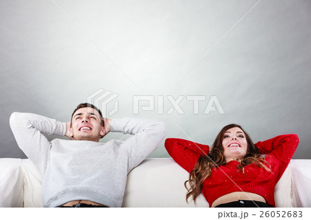 Happy couple relaxing resting on couch at home. Happy couple relaxing resting on couch at home. 26052683