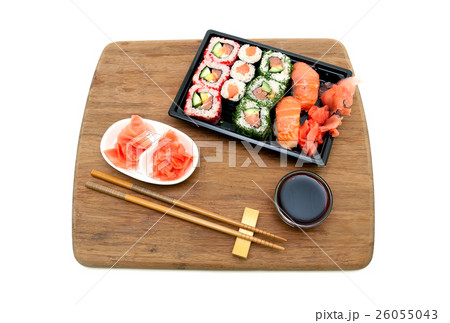 rolls and sushi on a bamboo board rolls and sushi on a bamboo board 26055043