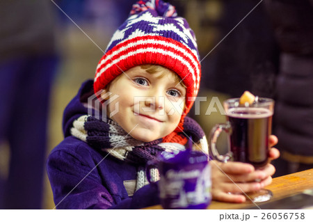 Little kid boy with hot chocolate on Christmas 26056758