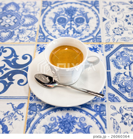 espresso coffee on white and blue tiles 26060364