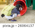 young mother playing with her baby on playground 26064137