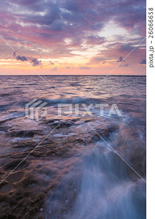 Long exposure sea and rocks at twilight Long exposure sea and rocks at twilight 26066658