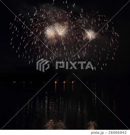 Colorful fireworks with reflection on lake. 26066842