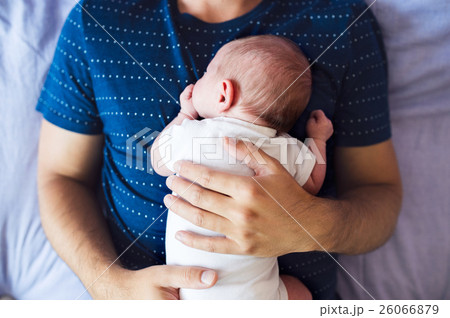 Unrecognizable father with his newborn baby son Unrecognizable father with his newborn baby son 26066879