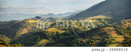 Sunny evening in mountains. Autumn village Sunny evening in mountains. Autumn village 26068510
