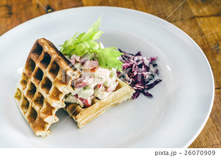 Savory waffles with salad 26070909