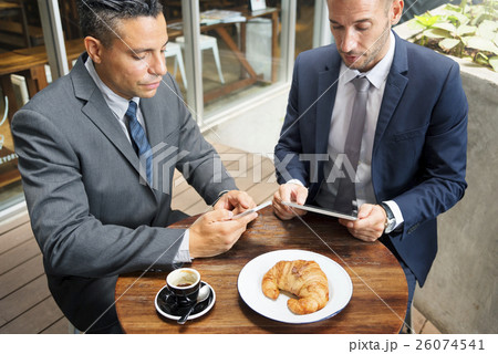Two Businessmen Cafe Meeting Wireless Tablet Concept Two Businessmen Cafe Meeting Wireless Tablet Concept 26074541