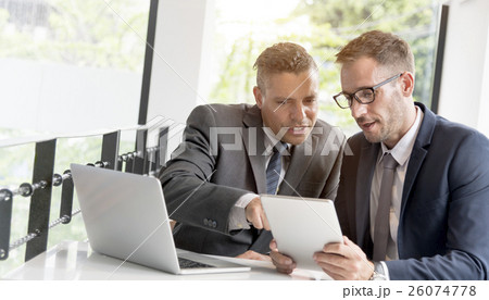 Two Businessmen Cafe Meeting Wireless Tablet Concept 26074778