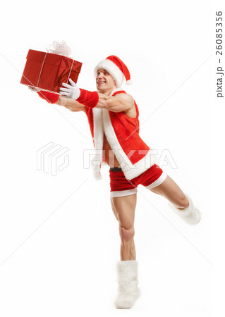 Cheerful fitness Santa Claus holding a red box Cheerful fitness Santa Claus holding a red box 26085356