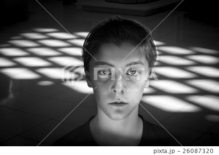 black and white portrait of a teenage boy 26087320