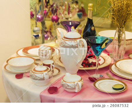 Elegant beautiful decorated table with utensils Elegant beautiful decorated table with utensils 26087532