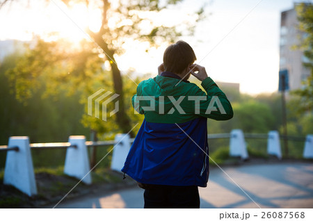 Toned Photo of Common young lonely man walking in 26087568