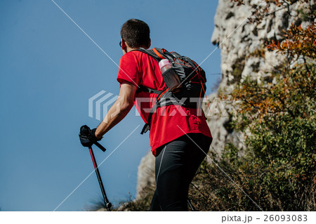 closeup male athlete with walking poles 26093083