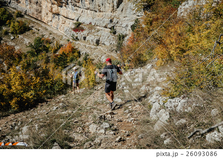 couple hikers with walking poles couple hikers with walking poles 26093086