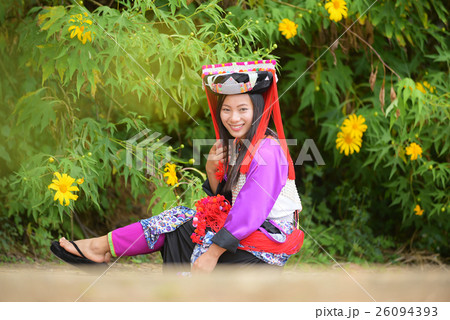 Happy beautiful Lahu tribe among mexico sunflower Happy beautiful Lahu tribe among mexico sunflower 26094393