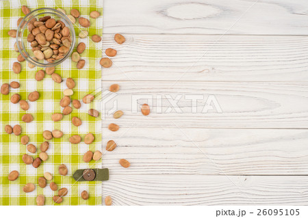 Beans in a glass bowl with on old wooden table. Beans in a glass bowl with on old wooden table. 26095105