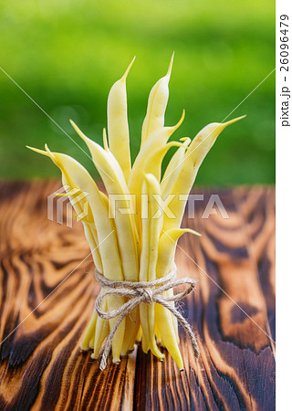 Organic yellow beans (french beans) on wood  26096479