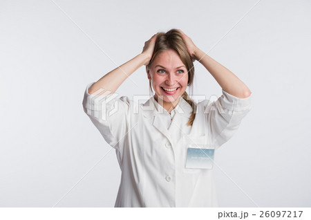Funny female nurse or doctor standing with hands Funny female nurse or doctor standing with hands 26097217
