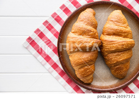 Tasty buttery croissants. Tasty buttery croissants. 26097571