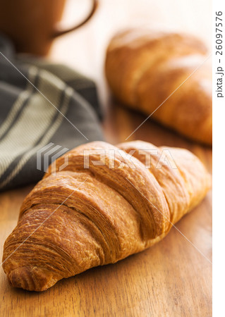 Tasty buttery croissant. Tasty buttery croissant. 26097576