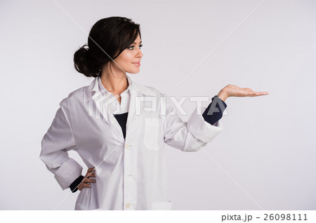 Pointing to blank copy space woman doctor nurse 26098111
