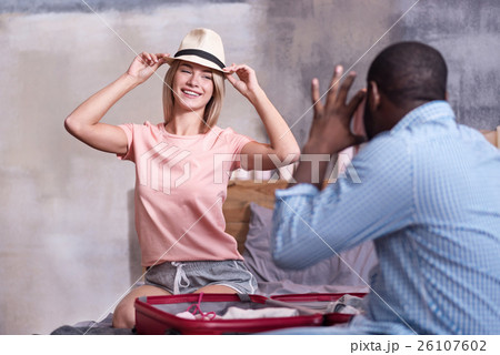 Pretty woman posing to her African boyfriend 26107602