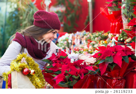 female customer choosing decorations female customer choosing decorations 26119233