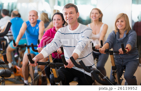 People cycling in a gym People cycling in a gym 26119952