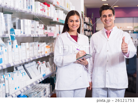 pharmacist posing in drugstore pharmacist posing in drugstore 26121753