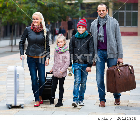 Parents with two kids chasing streets Parents with two kids chasing streets 26121859