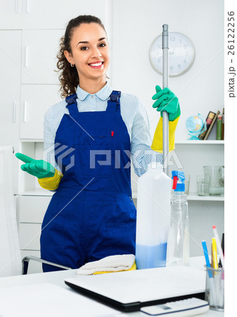 Portrait of girl doing professional clean-up 26122256