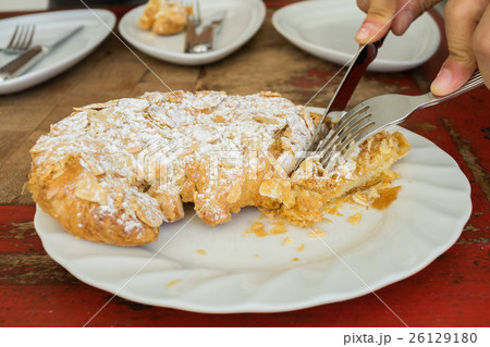 Fresh baked Croissant with Almond topping 26129180