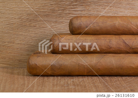 Luxury Cuban cigars  on the wooden desk 26131610