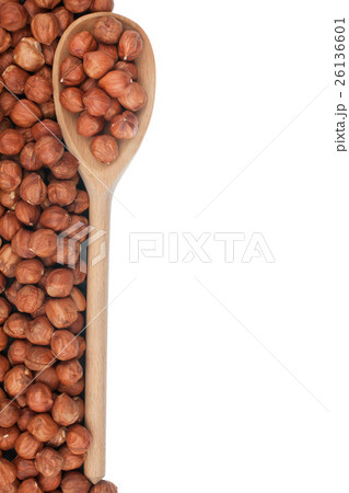 Wooden spoon with hazelnuts Wooden spoon with hazelnuts 26136601