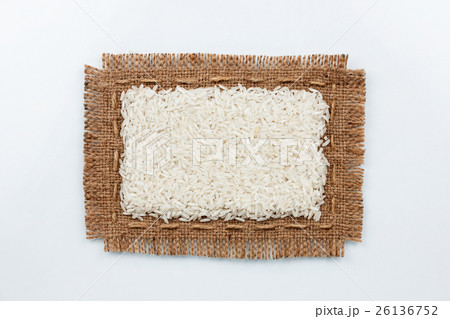Classical frame made of burlap with grains of rice 26136752