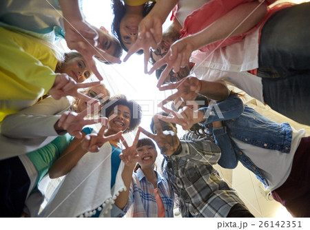 international students showing peace or v sign 26142351