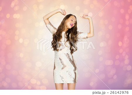 happy young woman or teen girl dancing at party happy young woman or teen girl dancing at party 26142976