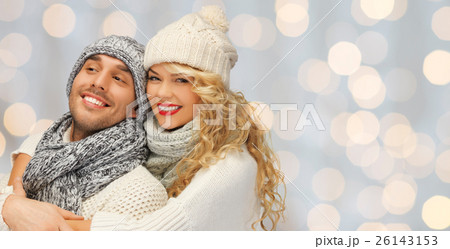 happy family couple in winter clothes hugging happy family couple in winter clothes hugging 26143153