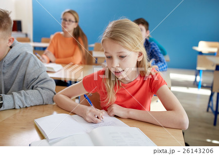 student girl with book writing school test 26143206